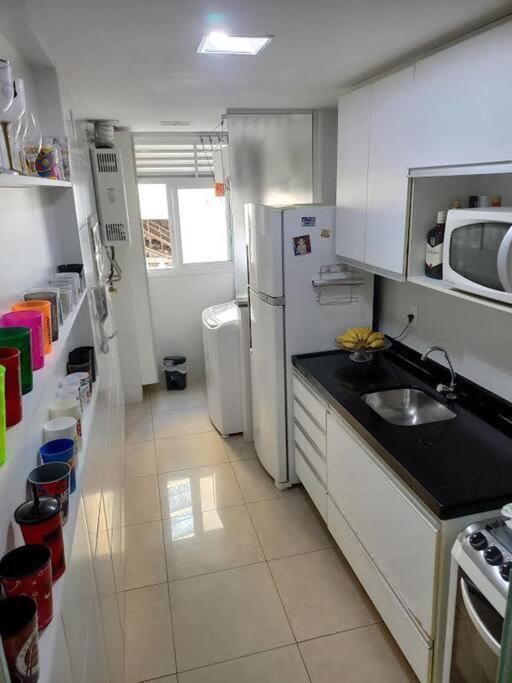 Em Casa. *